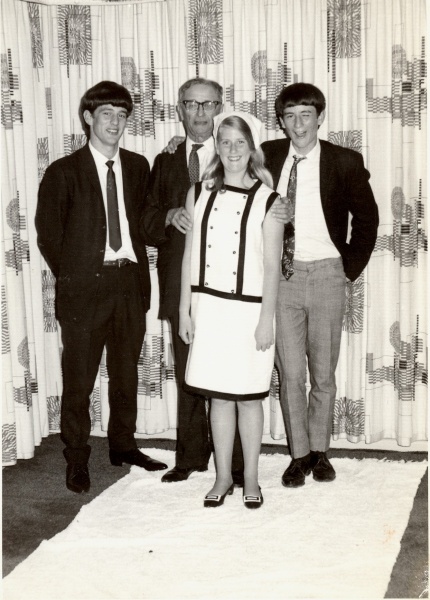 Me, with my Grandpa and brothers at my cousin's wedding. The one on the right (aged about 15) had been cadging drinks from the waiters all night!