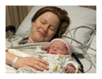 My niece Kim and my newest precious grandniece:  Kaitlin Virginia, born at 3:27 pm, December 1, 2009.  8 lbs. 7oz., 20 1/4" 