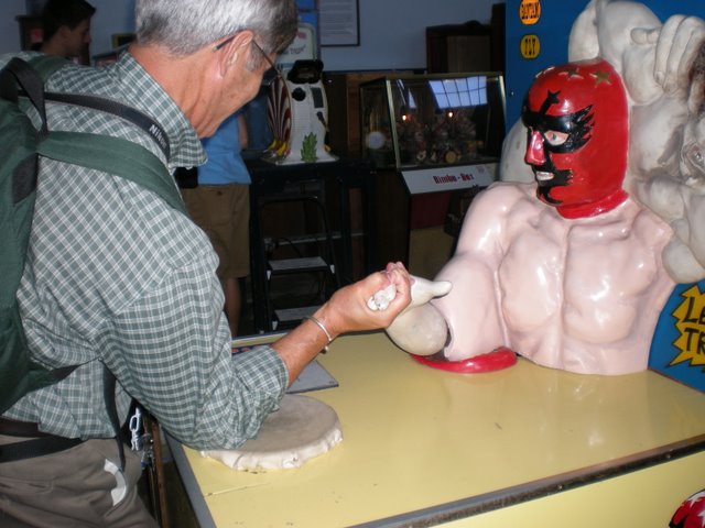 Rob loses a hand wrestling match in a nifty arcade museum at Fisherman's Wharf