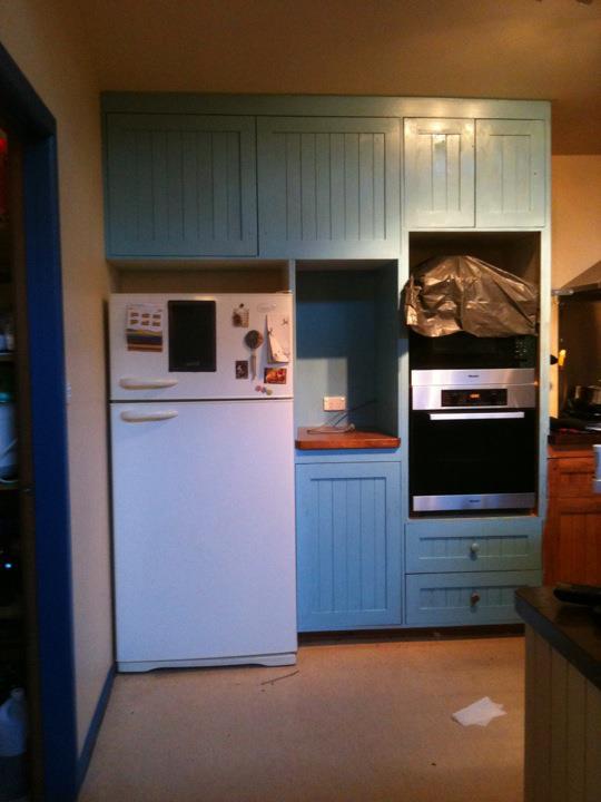 I still need to fill some glaring holes, resand and top coat, but this is pretty much how the kitchen will look once it's finished. I only have one week to get it all done before the floor goes down...EEEEK!