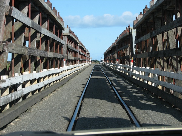 Not only did we have to master driving on the left, we also had to share the one lane bridges with trains!