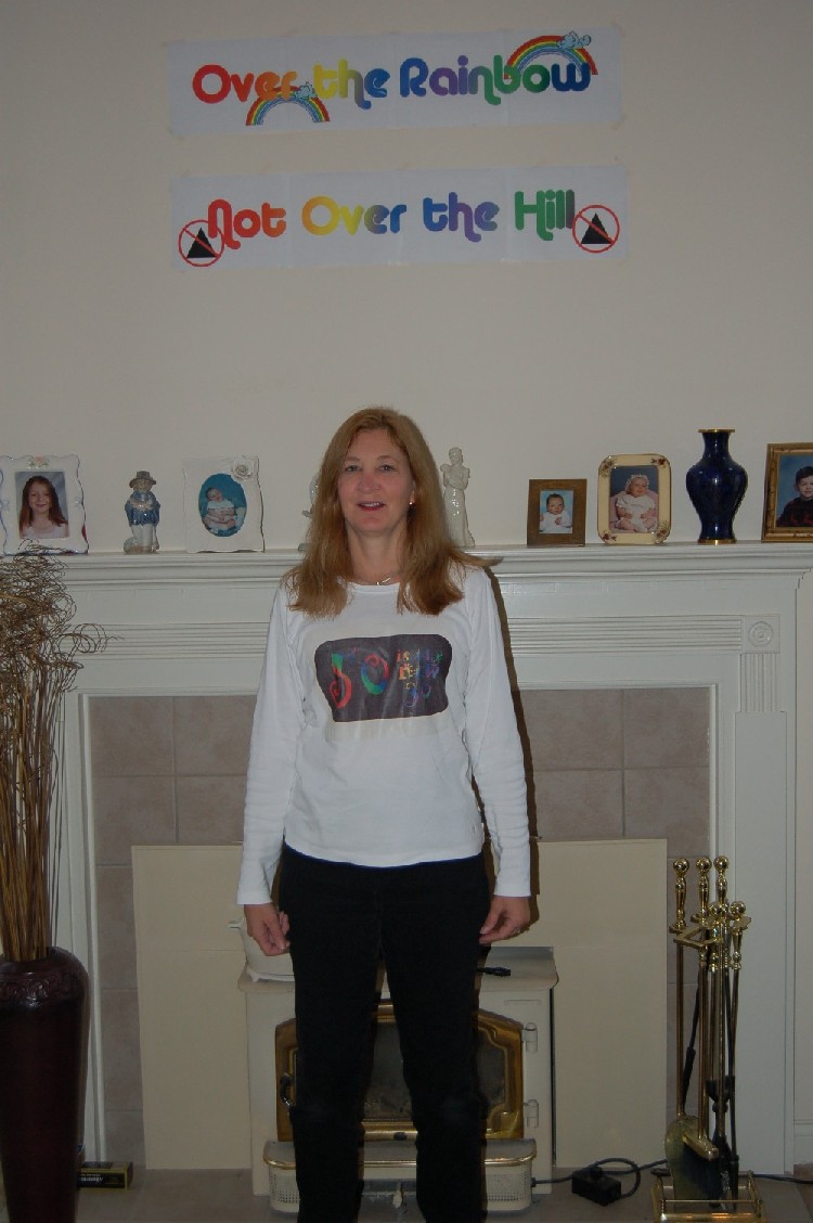 My "theme" was rainbows. I am not feeling "over the hill" just yet! I made the iron-on for my shirt which reads "50 is the new 30".