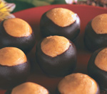 These are the eating type of buckeye!  Chocolate balls filled with peanut butter, made to resemble the actual buckeye nut.  Yummm!