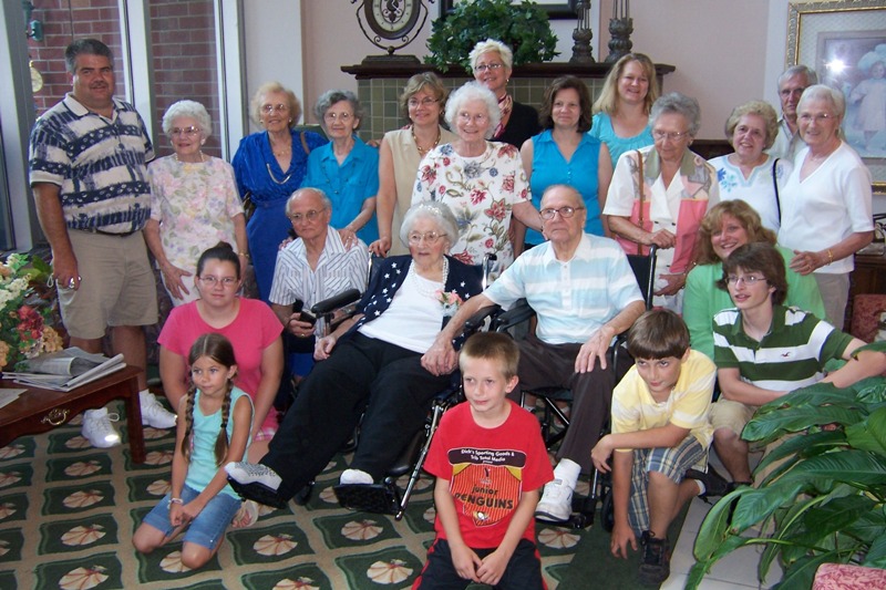 Aunt Viola's 100th birthday celebration, God bless her!  This is my mom's aunt, her dad's sister.  She always said she was going to live to be 100 and by gosh she did it!  My mom is right behind Aunt Viola in the wheelchair, my sister Lora is to the (picture) left of my mom, and of course I am in the back (as always)!