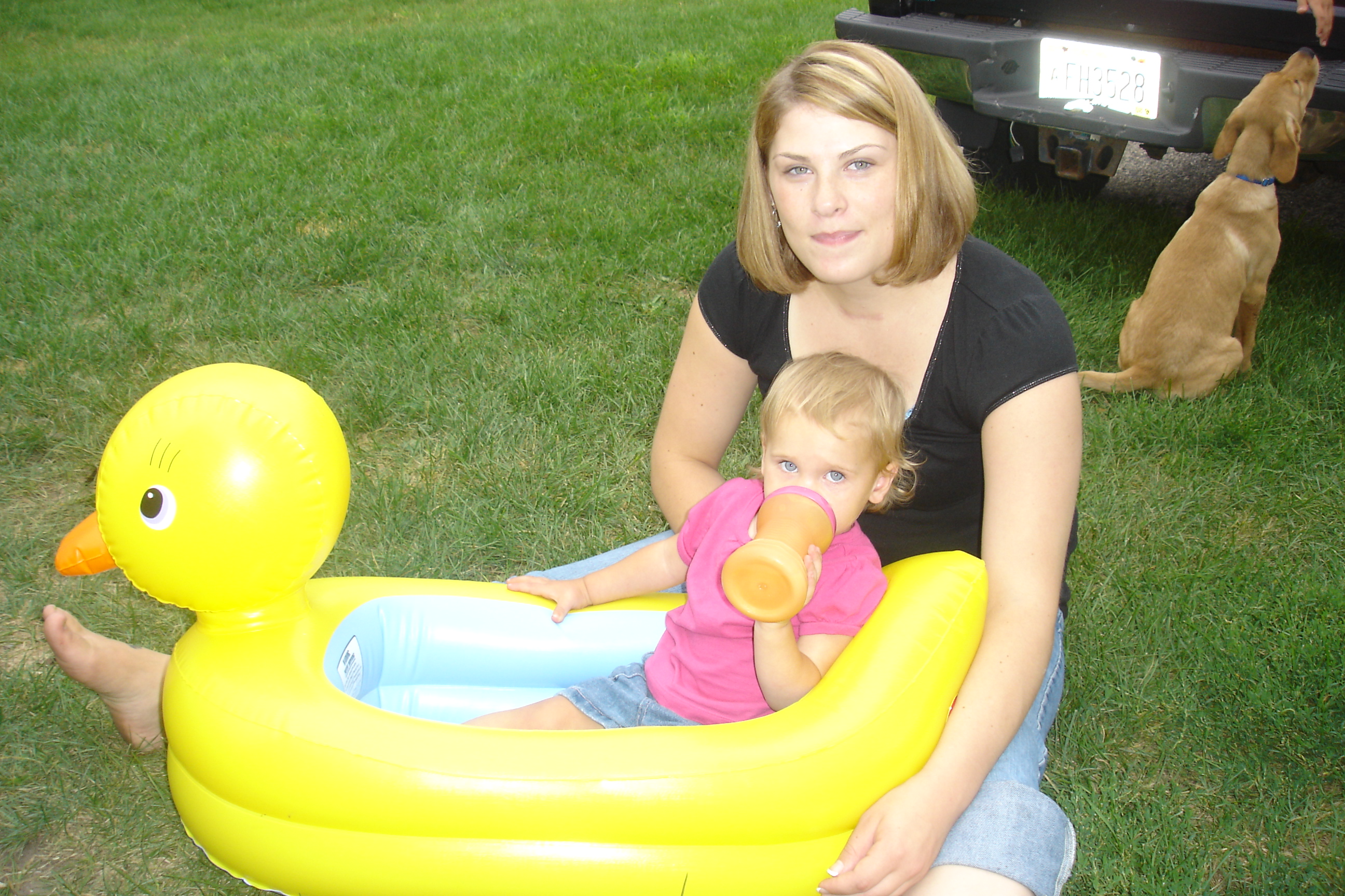 Adam's girlfriend and daughter (isn't she just cute as heck)