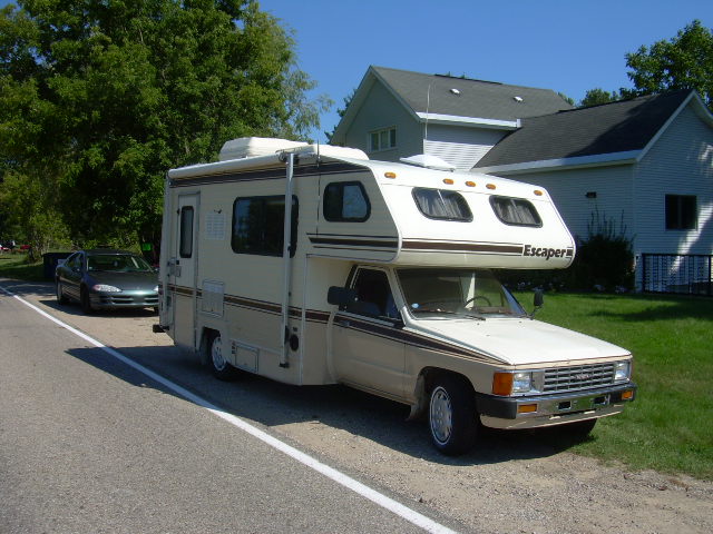 The trusty camper where we bought it at Mancelona Michigan fueled up and ready to go. Woo Hoo at last                                