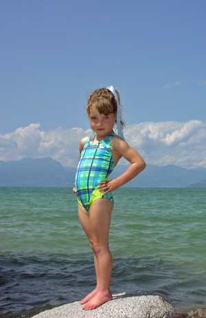 daughter Daisy dancing on the shore of Lago di Garda in italy.  not recent, but i liked the photo.