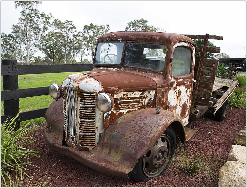 Proudly on display at the front gate instead of rusting away down the back paddock.