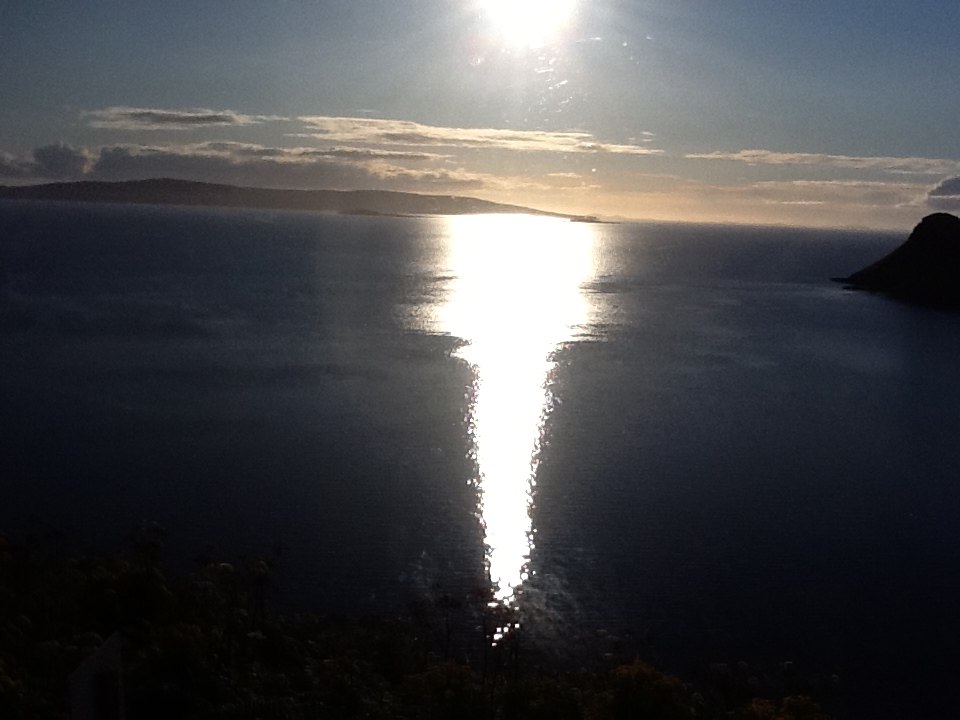 include this shot. Sometimes my iPad amazes me with what it can accomplish. This is a picture of one of the many bays around the Isle of Sky, from inside the bus.