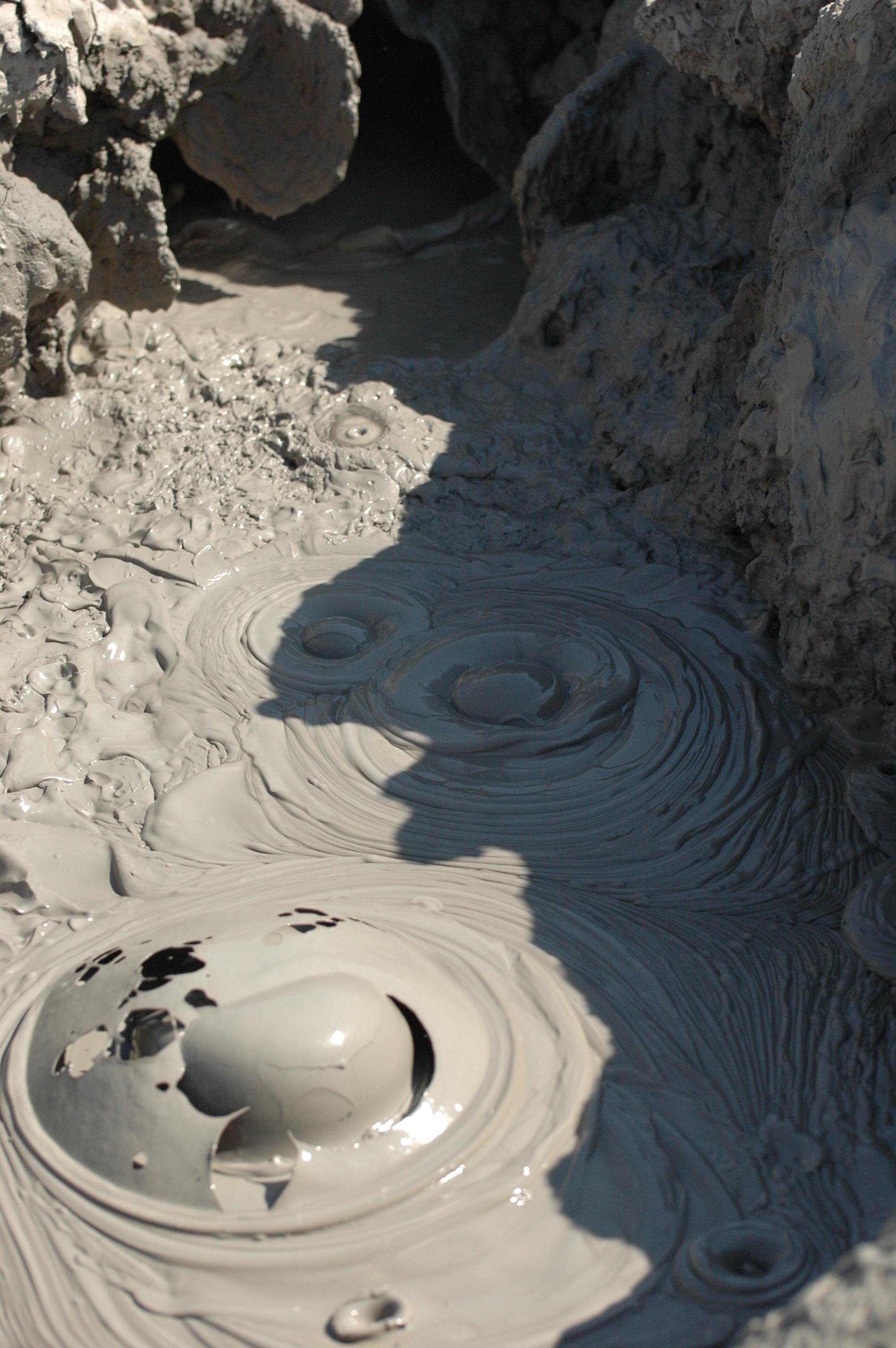 A mud pot bubble bursting