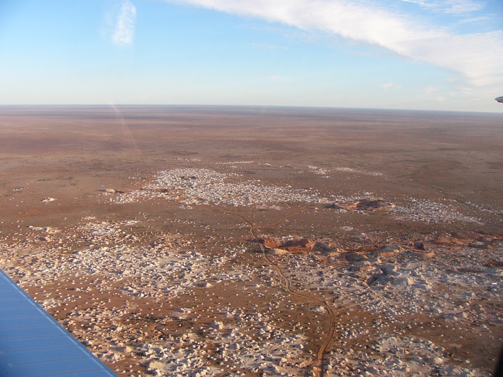 Arriving over Coober Pedy, the Opal Capital of Australia, seeing all the mines