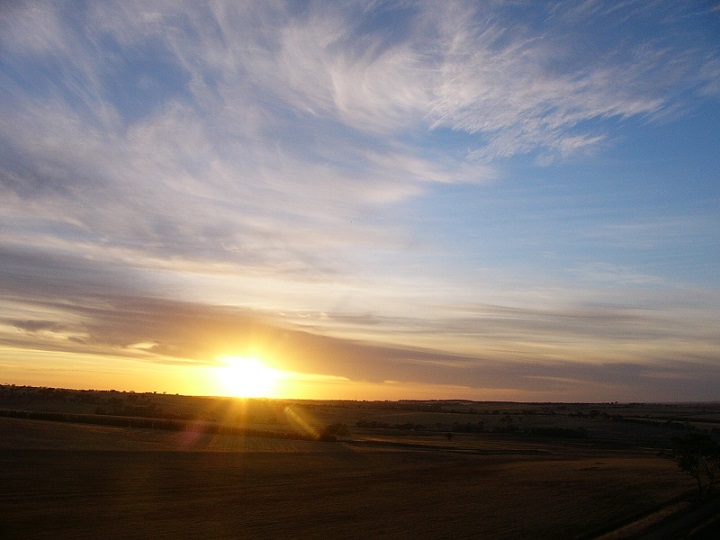 Sunrise and fluffy clouds