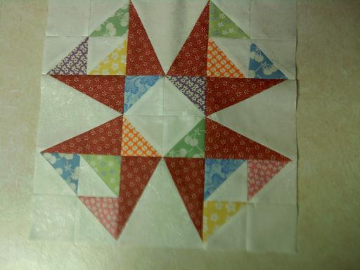 I made this square for a contest on the Quilt in a Day and Eleanor Burns page on the other site.  If you are a member there, please vote for me!