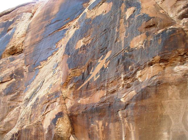 These lizards etched in desert varnish high on the side of a cliff can be seen from the valley floor.  It would be interesting to know why the Fremont Indian culture chose lizards and why that particular spot.