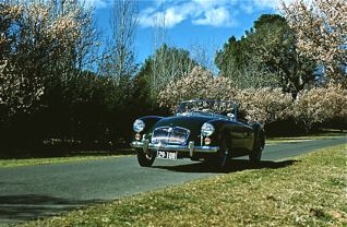 British Racing Green wonder car.  Much British Racing Green.  Much more suitable for an ADC to the Governor General.

