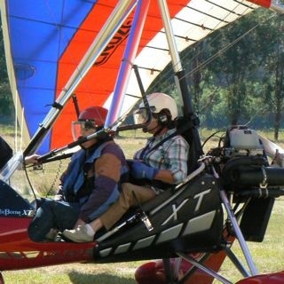 Herself in a Microlight at Bright.