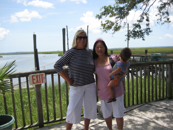 The gracious Jane of St Simons Island and her shortness, me holding the distracted Brandon!