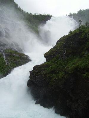 A waterfall viewed from the Flam Railway in Norway