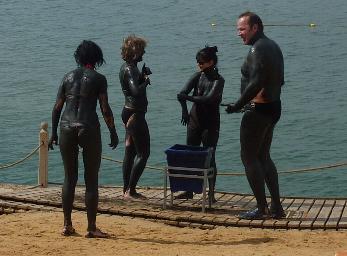 You could coat yourself in this black mud from the Dead Sea and when it dried you floated in the water until it washed off. Supposed to be very therapeutic. Yes I did put mud on and float in the sea but these people look better in their costumes than I do in mine!