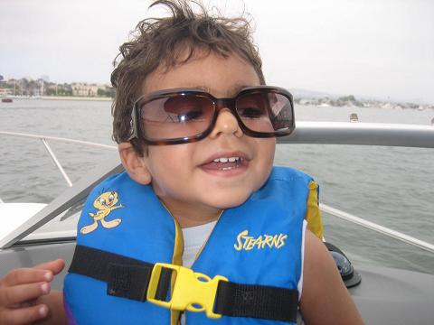 Kevin in his safety clothes in a boat tour in New Port Beach.