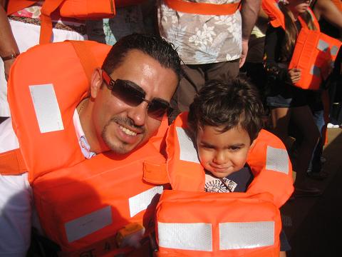 Kevin and his Dad put on their safty clothes for test .