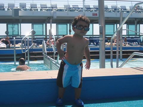 Kevin is ready to enjoy swimming in top deck swimming pool.