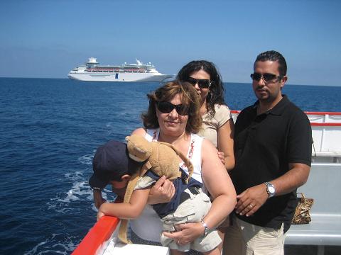 A family picture and our Cruise in its back ground.