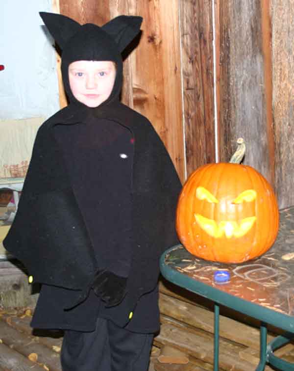 The bat and her jack-o-lantern.