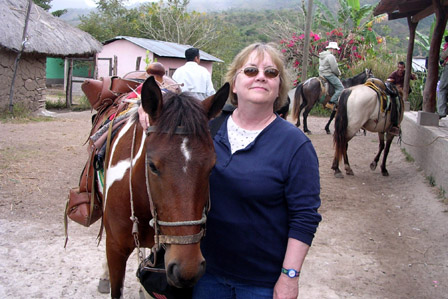 Chacha, my transportation to the village. Like the hairdo? We rode through wind and rain!