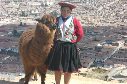 Local woman and friend. Cusco in the background.