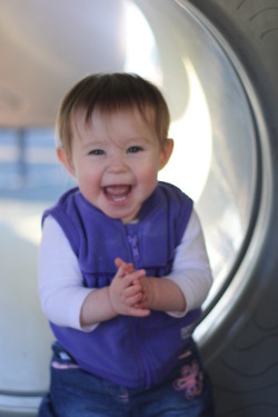 Ella loves the park playground she crawled through the tube and got out of it by herself.